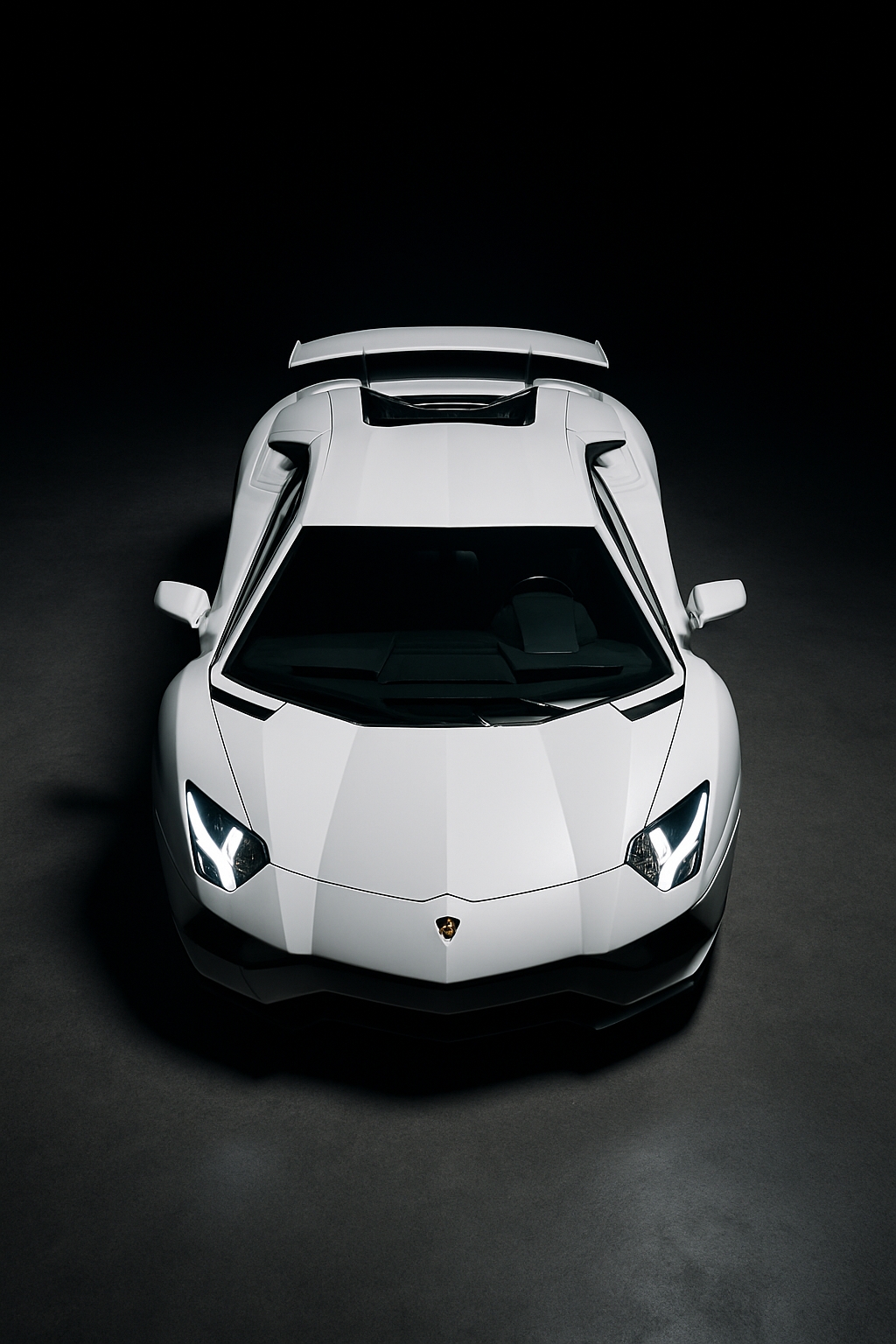 Sleek Overhead Shot of a White Lamborghini Sports Car Mobile Wallpaper