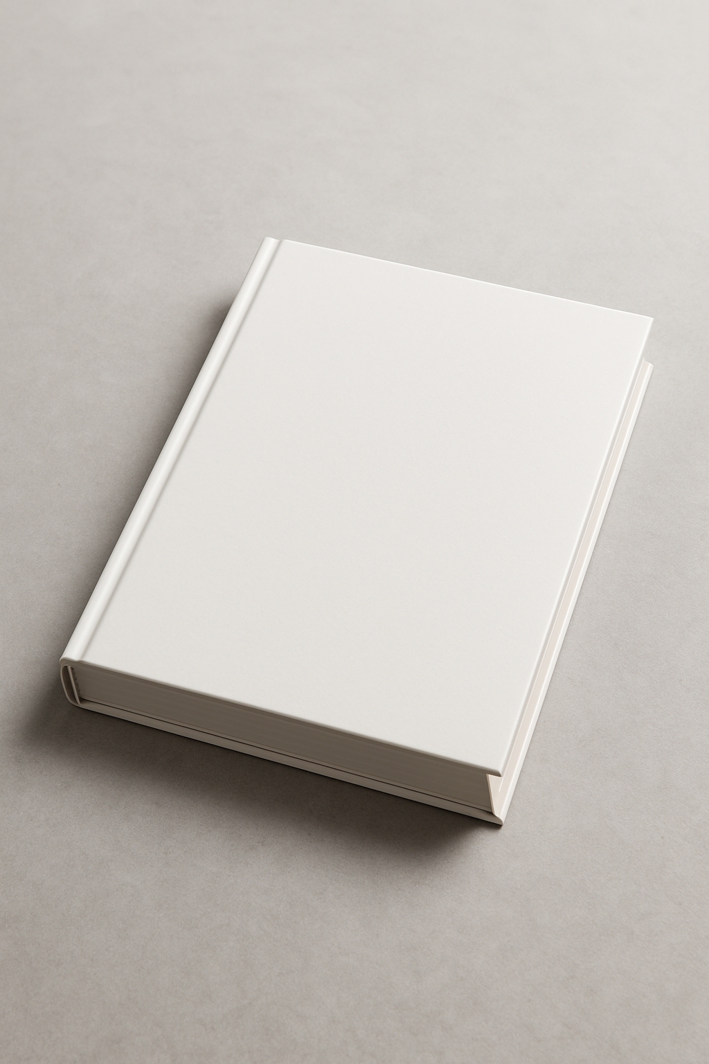 Elegant White Hardcover Book on Minimal Gray Surface Mockup
