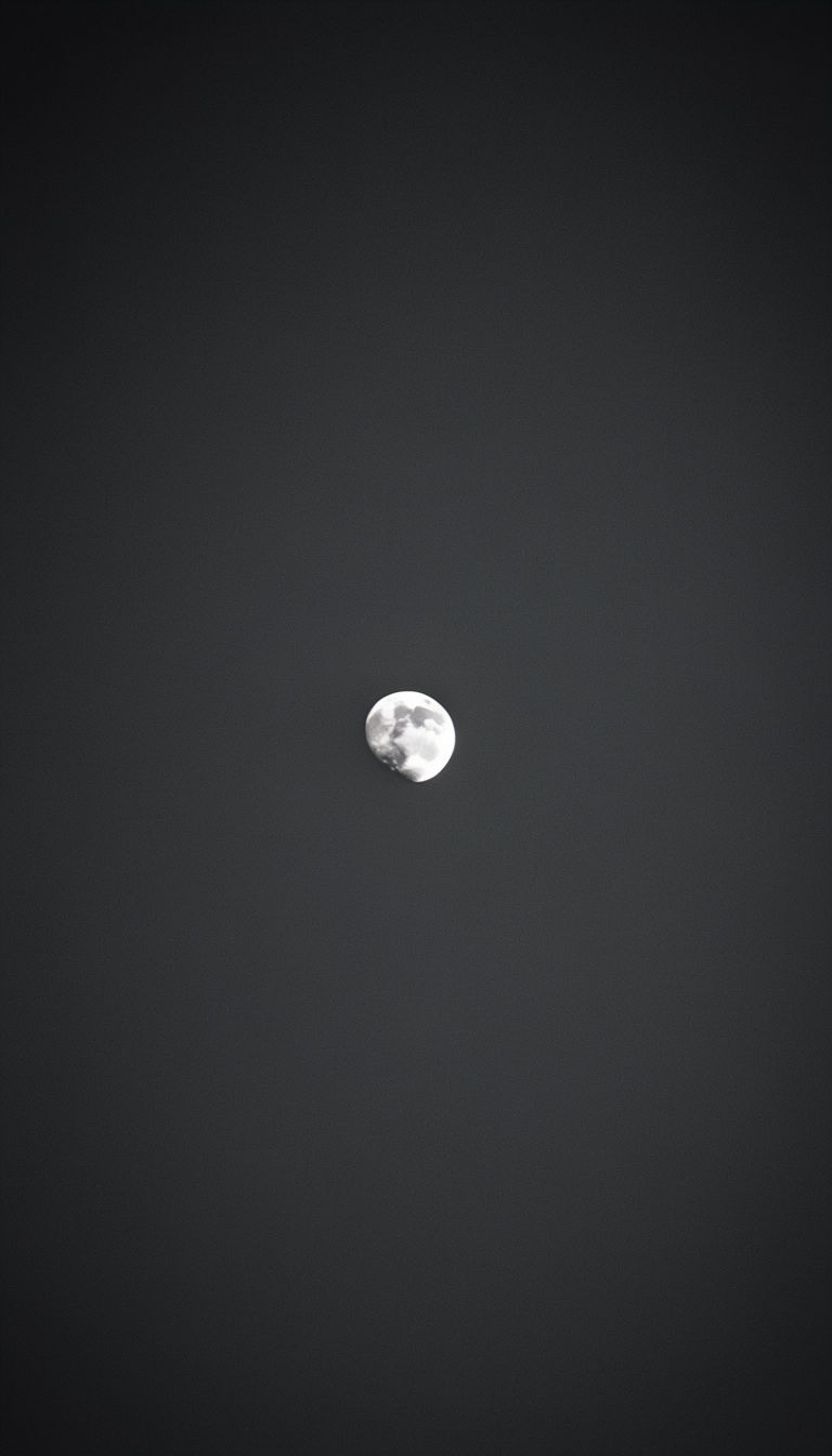 Minimalistic Waxing Crescent Moon Against Dark Night Sky Mobile Wallpaper