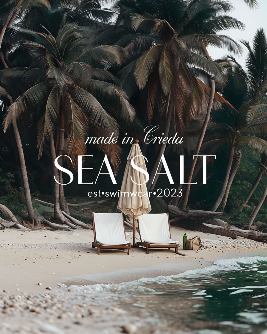 Serene Beach Scene with Lounge Chairs and Umbrella Advertisement