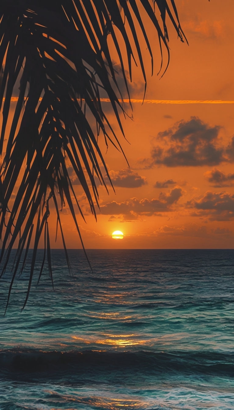 Serene Sunset Over Ocean with Palm Fronds Mobile Wallpaper