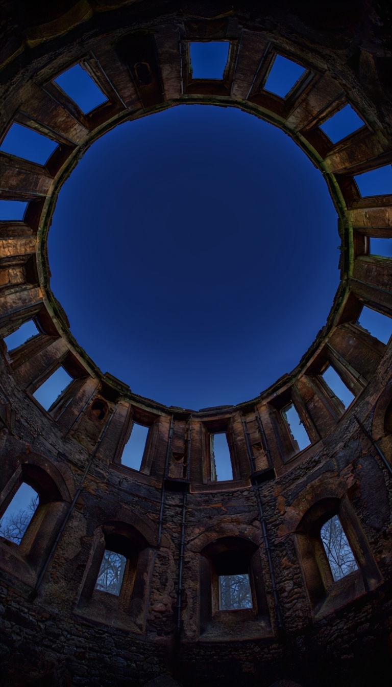 Eerie Abandoned Castle Tower Interior at Dusk Mobile Wallpaper