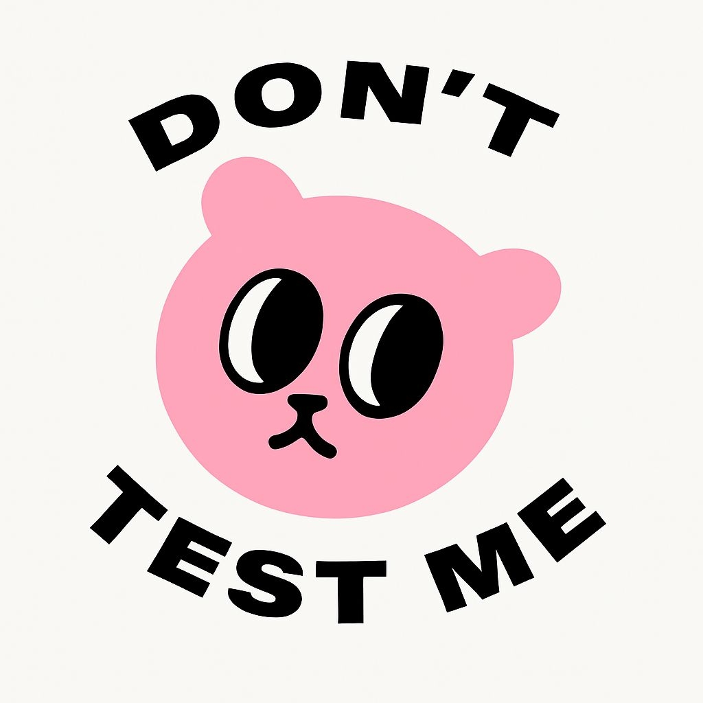 Playful Pink Cartoon Cat Face with 'Don't Test Me' Phrase Sticker