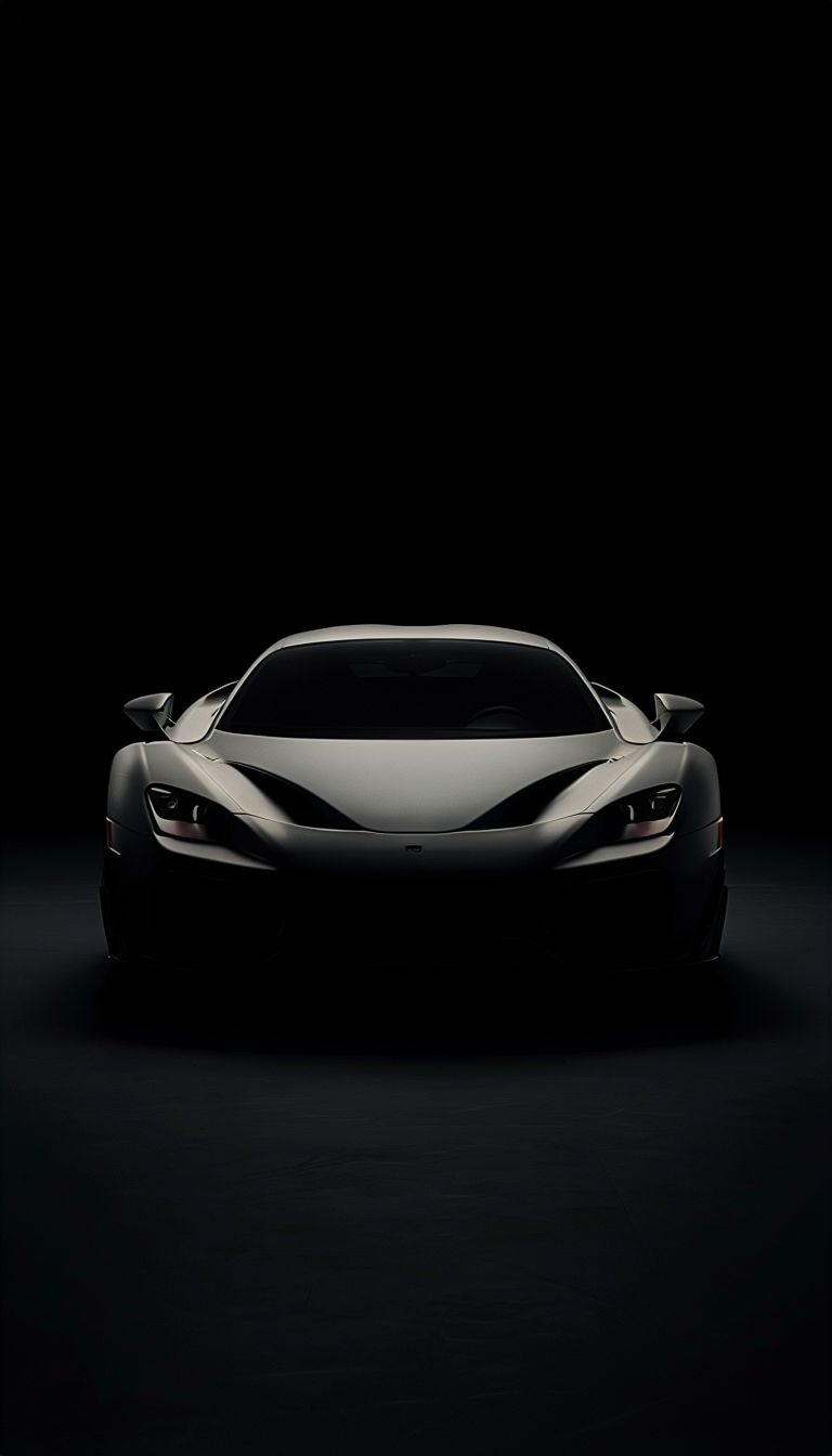 Sleek Gunmetal Gray Sports Car in Dramatic Low-Key Lighting Mobile Wallpaper
