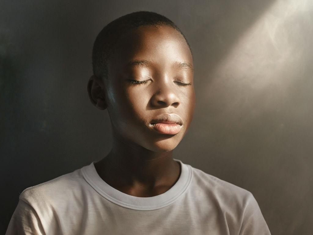 Serene Close-Up Portrait of a Young Black Teenager