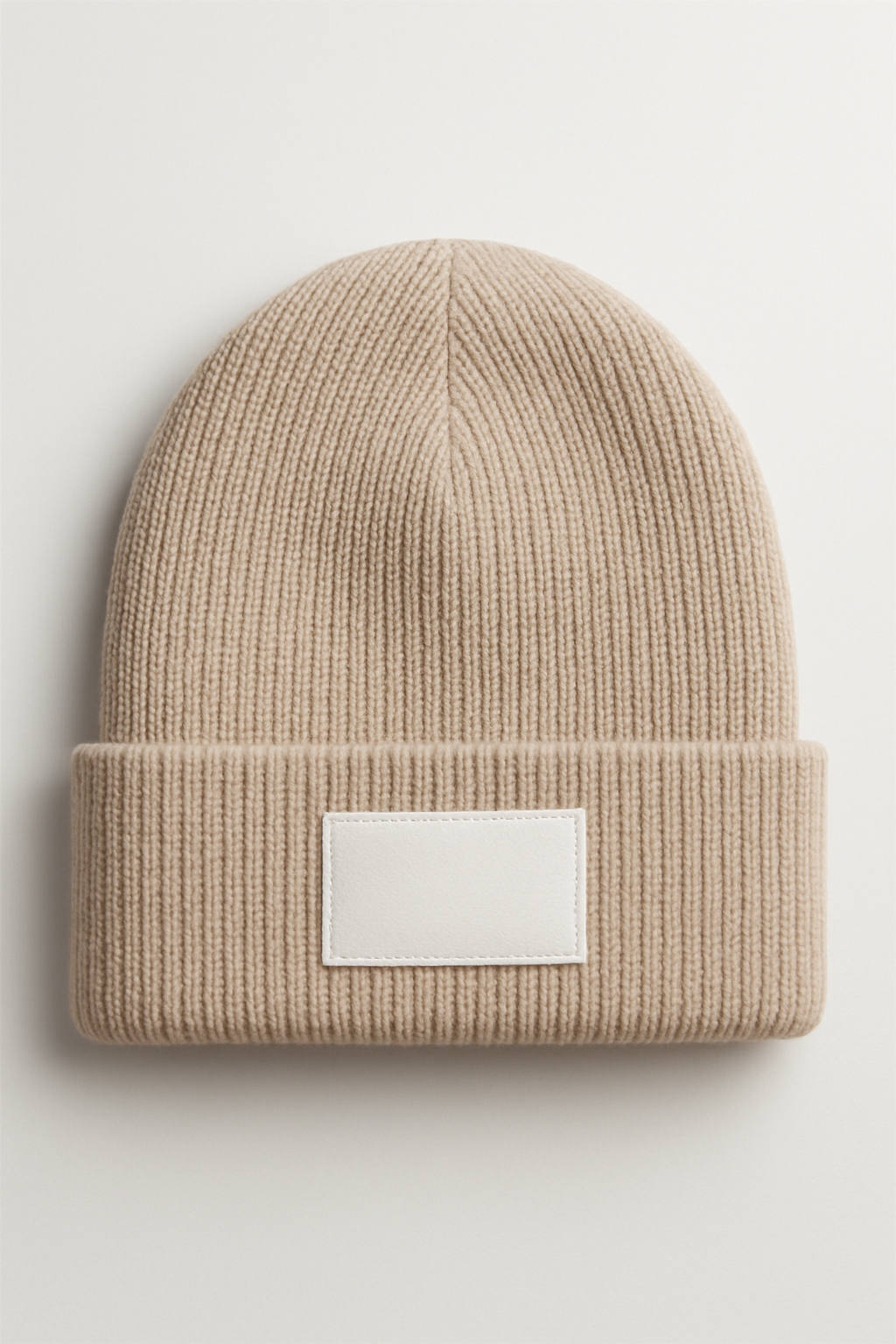 Beige Knitted Beanie Close-Up with Ribbed Texture Mockup