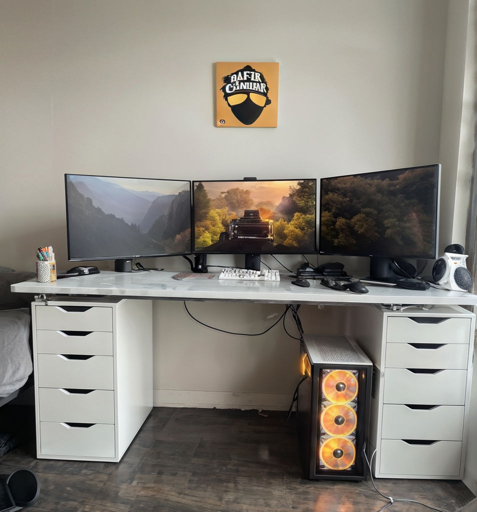 Custom computer with three screens. by Kevin Romano - Playground